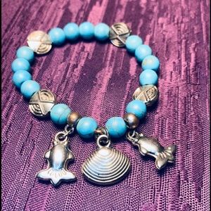 2/$20 Turquoise Fish Seashell Charm Stretch Bracelet.